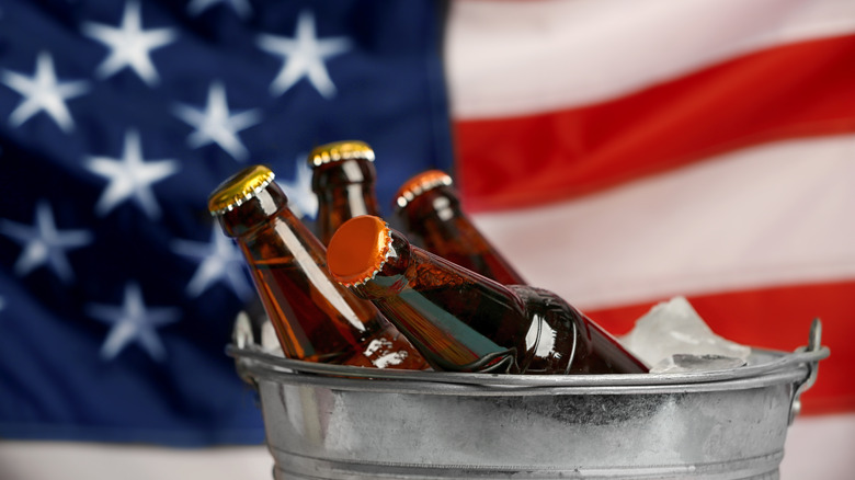 bucket of beers with american flag in the background