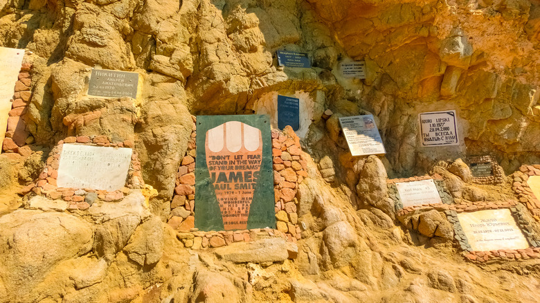 Memorial plaques on cliffside