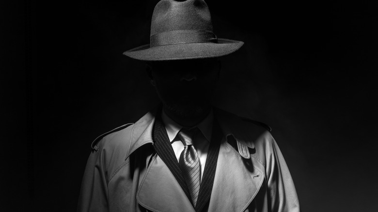 Old-school mobster in shadows