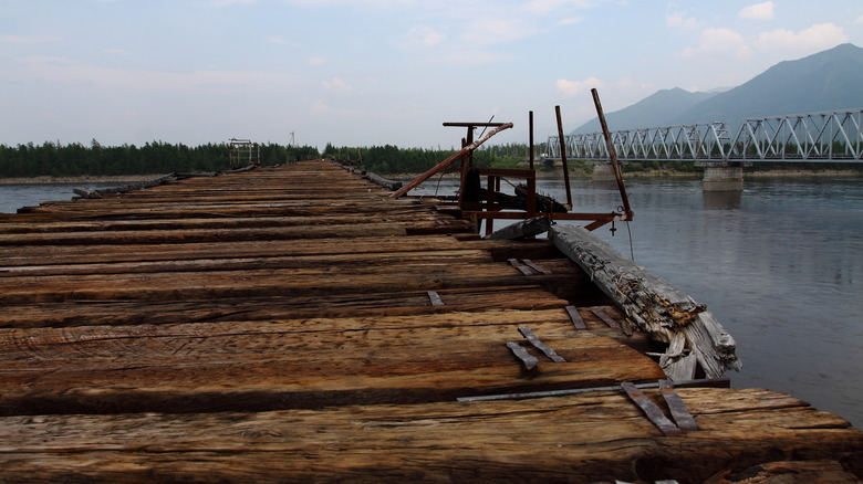 wood planks of vitim river bridge