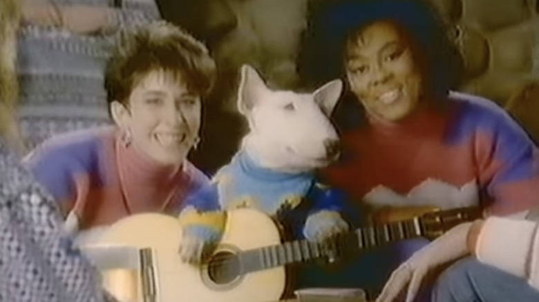 Spuds MacKenzie playing guitar