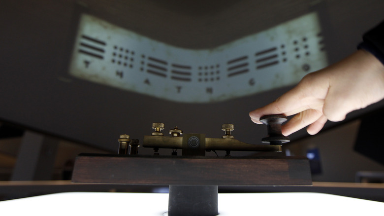 Hand operating a telegraph machine