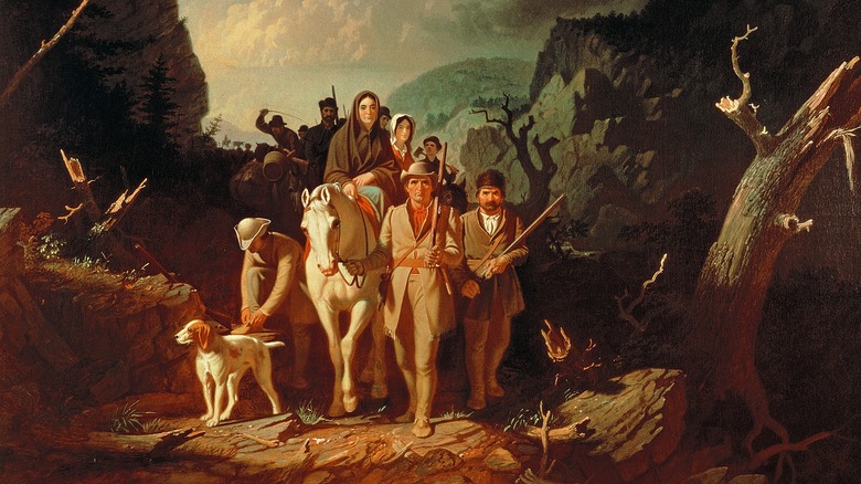 daniel boone escorting settlers through the cumberland gap