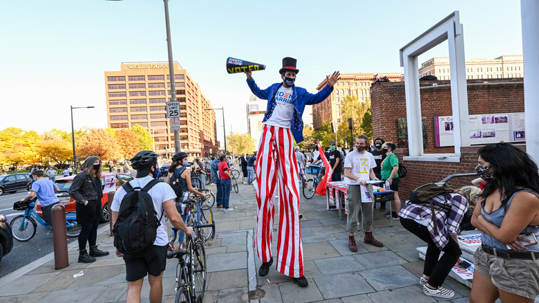 Uncle Sam mascot on stilts
