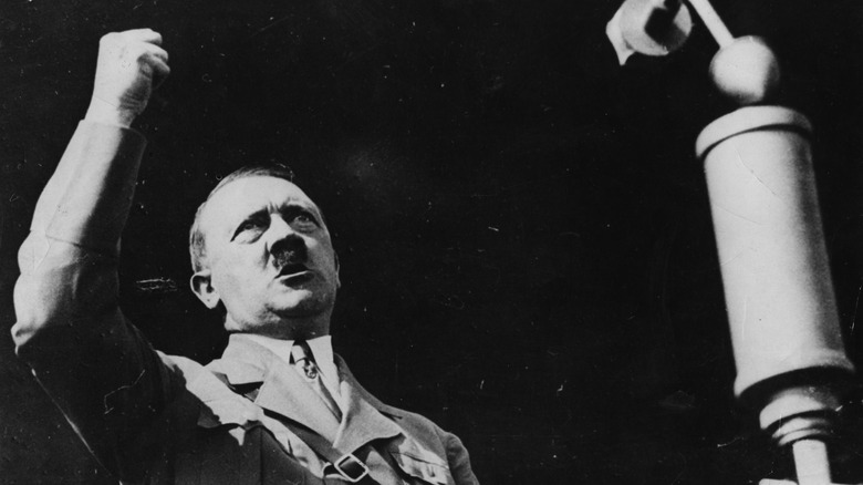 Adolf Hitler arm raised in speech