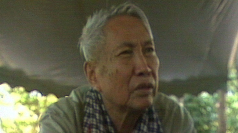 Pol Pot leaning forward