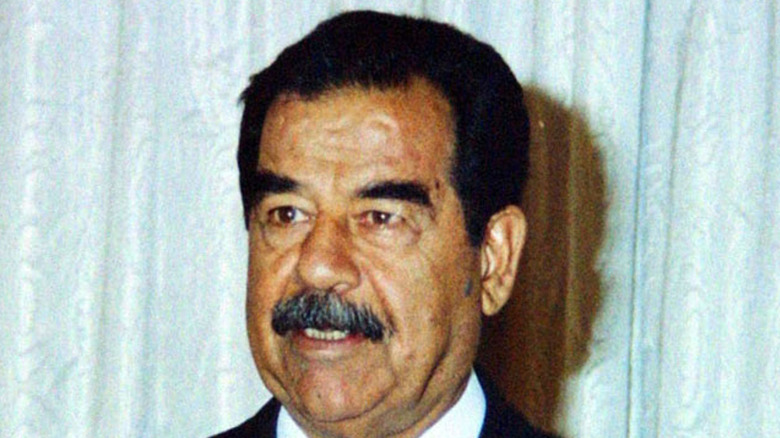 Saddam Hussein giving speech