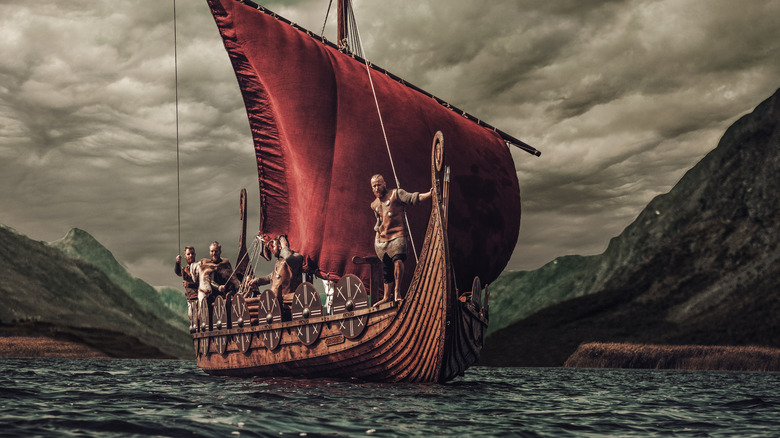 Viking longship sailing on water