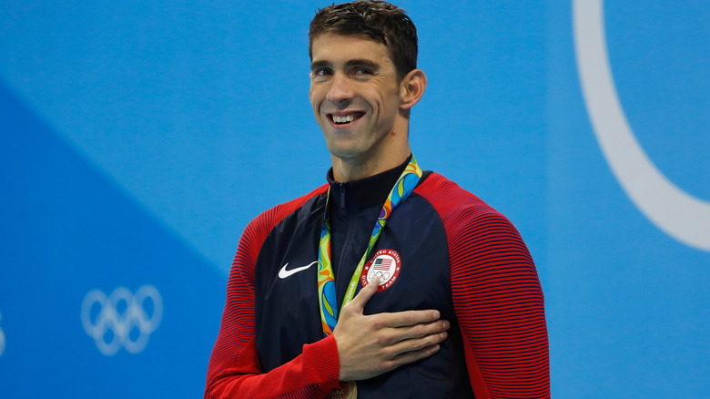 Michael Phelps with hand over heart