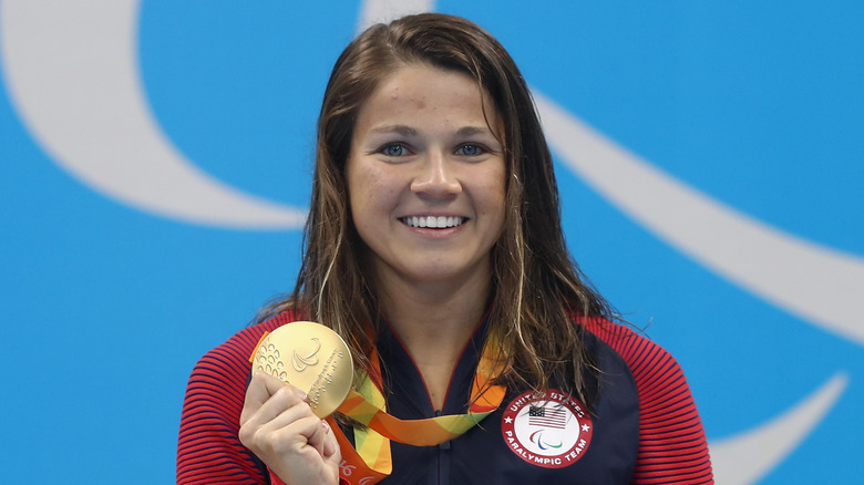 Becca Meyers at Rio Paralympics with medal