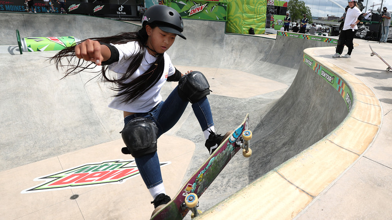 Kokona Hiraki skating up ramp