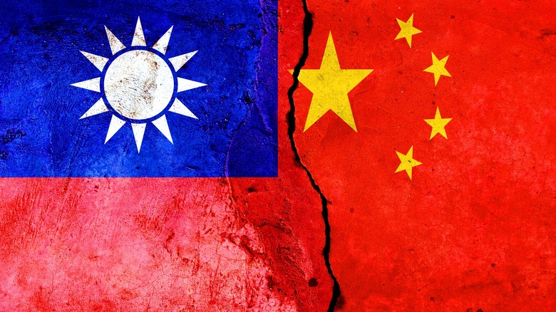 Taiwan and Chinese flags rupturing