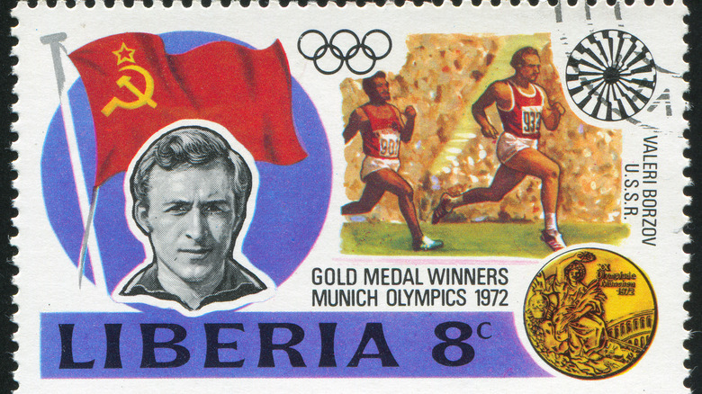 Stamp showing Soviet runner and Olympic rings
