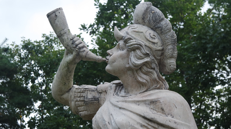 greek statue trumpet
