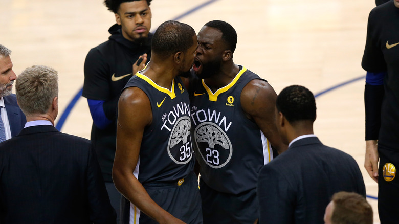 Kevin Durant arguing with Draymond Green