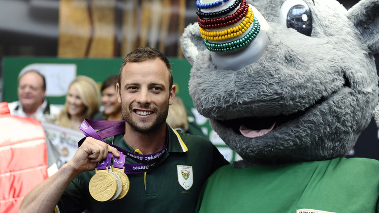 Murderer Oscar Pistorius with his Olympic medals
