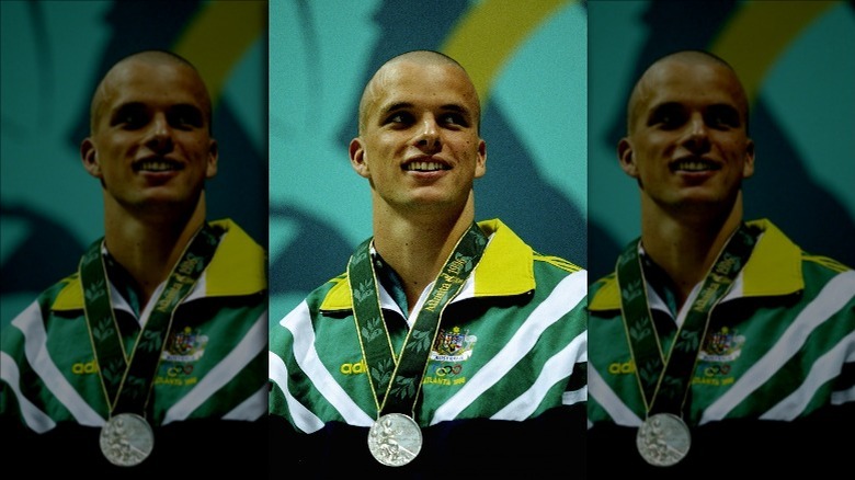 Scott Miller with his olympic medal