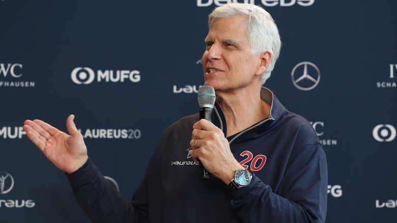 Mark Spitz speaking into mic