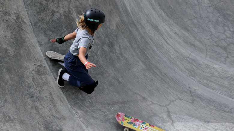 Sky Brown sliding down ramp