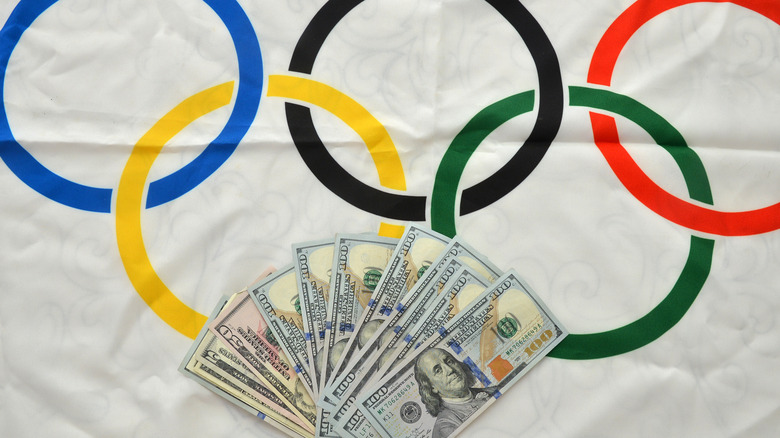 Olympic flag and money