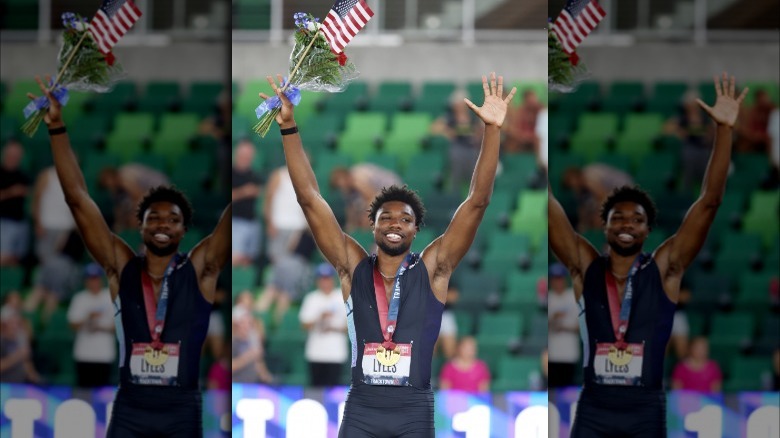 Noah Lyles with arms raised