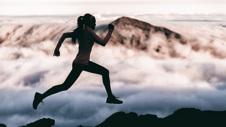 silhouette of runner 