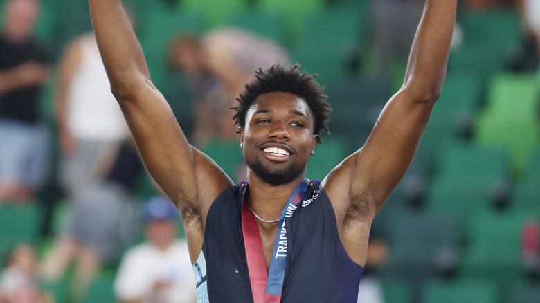 Noah Lyles celebrating