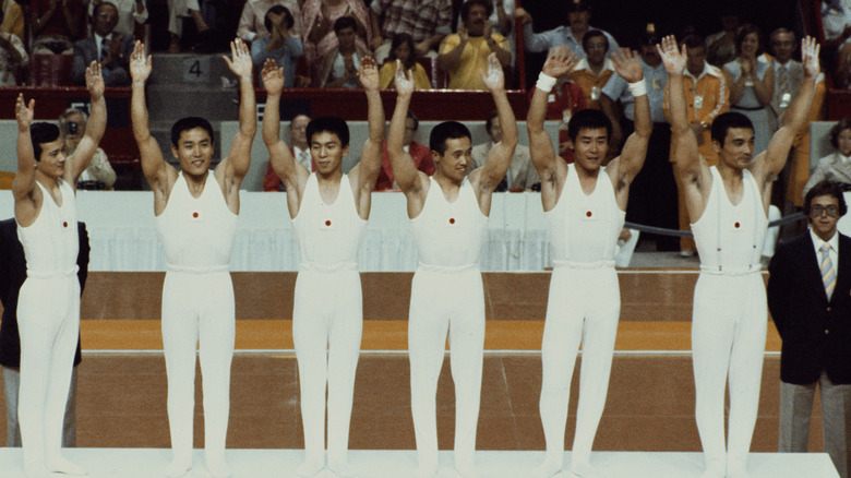 Sawao Kato with gymnastics team