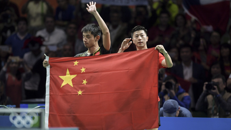 Chinese table tennis team celebrating at Olympic games
