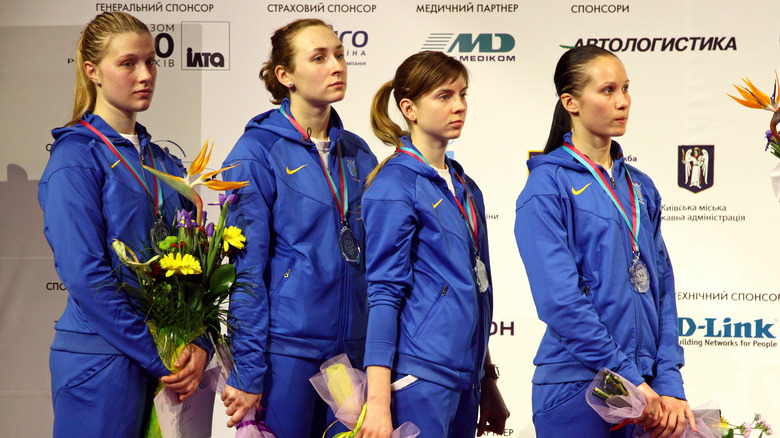 Ukranian saber team receiving silver medals in 2012