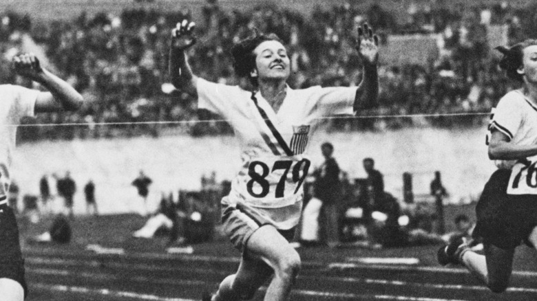 Betty Robin crossing the finish line