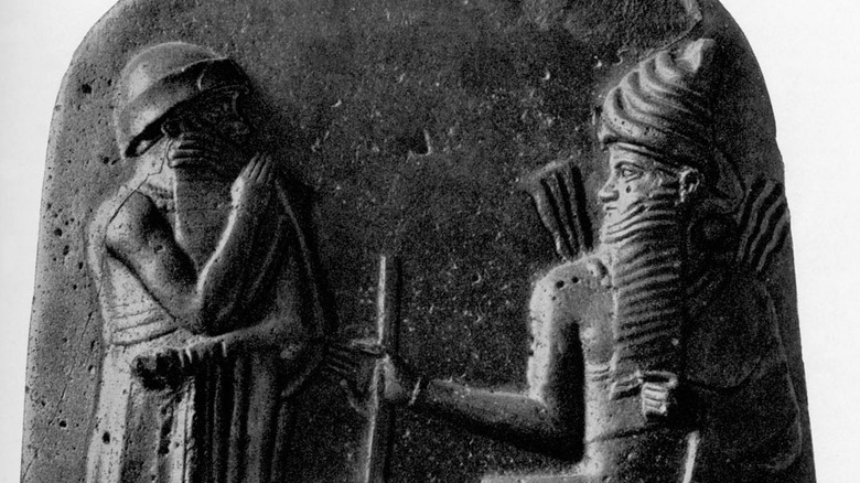 steel inscription of Hammurabi receiving the codes of conduct from the god Shamash