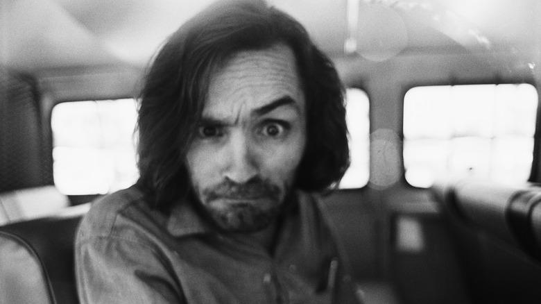 Charles Manson posing for the camera