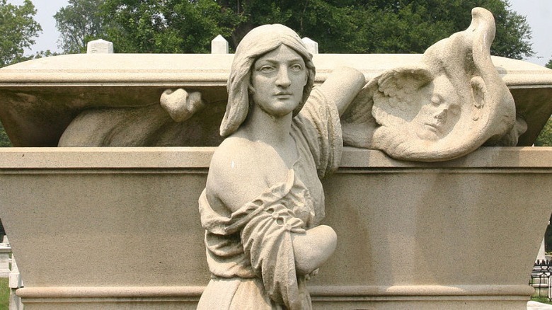 Laurel Hill Cemetery tombstone woman releasing soul