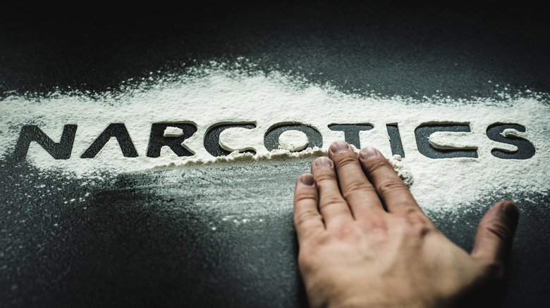 Narcotics spelled in white powder
