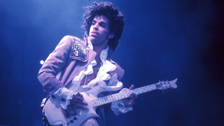 prince playing guitar