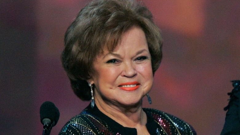 Shirley Temple on stage, smiling