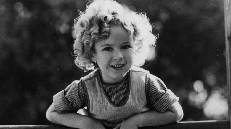 Shirley Temple posing and smiling