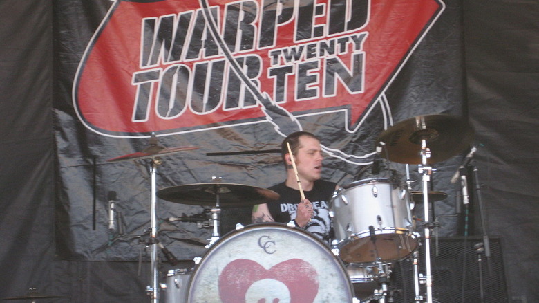Derek Grant on stage at Warped Tour