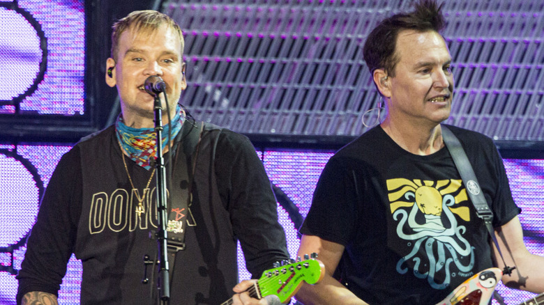 Mark Hoppus and Matt Skiba on stage