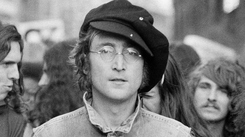 John Lennon protesting
