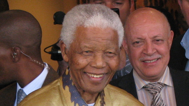 Cropped photo of Nelson Mandela in 2008 from South Africa The Good News, https://creativecommons.org/licenses/by/2.0/