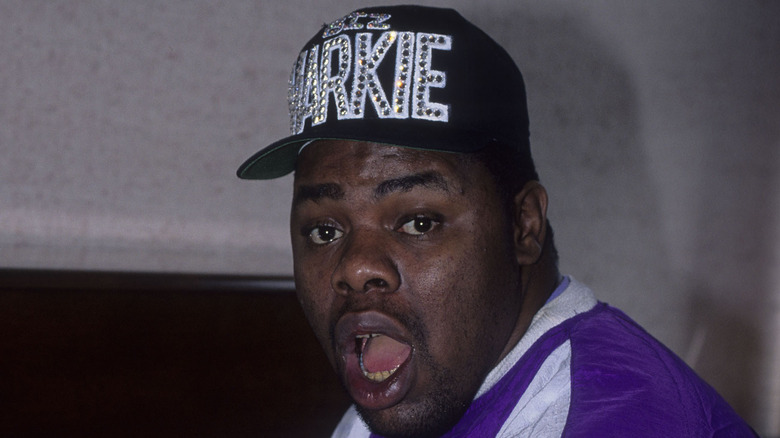 Biz Markie baseball cap mouth open