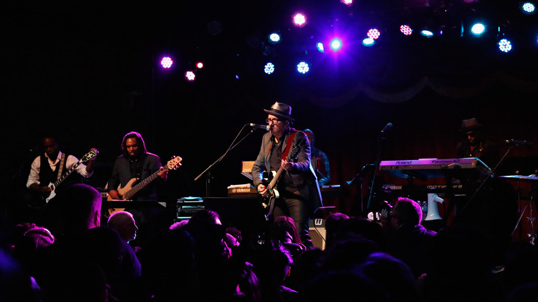 Elvis Costello performing with The Roots