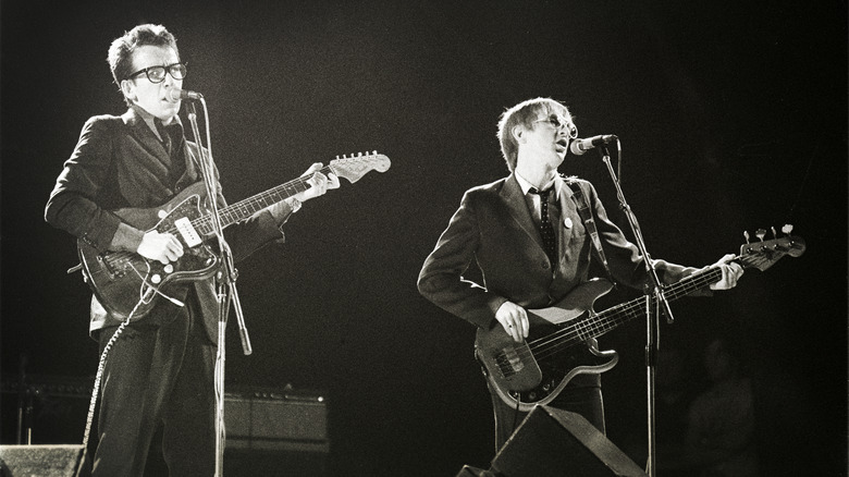 Elvis Costello and Bruce Thomas on stage