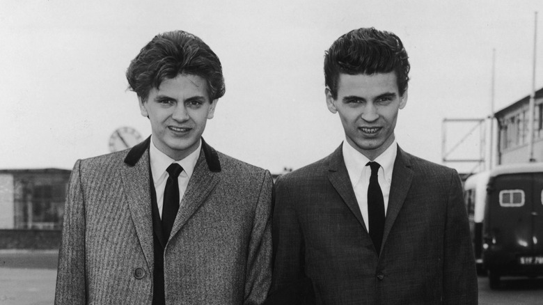 The Everly Brothers smiling black and white suits 1960