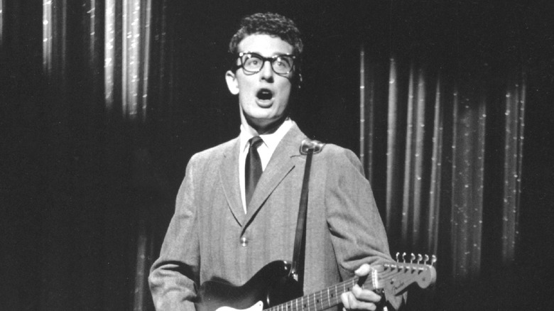 Buddy Holly on stage with guitar 1958