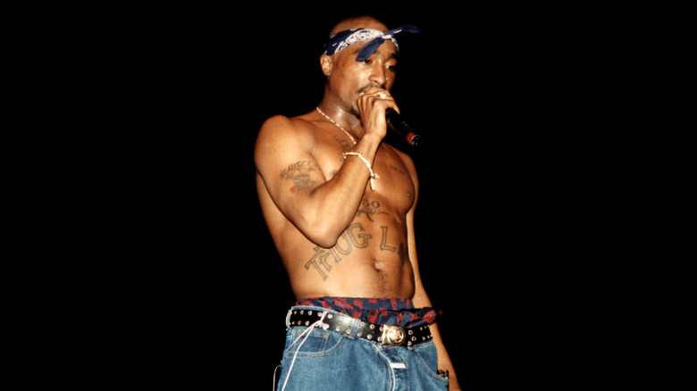 Tupac performing onstage