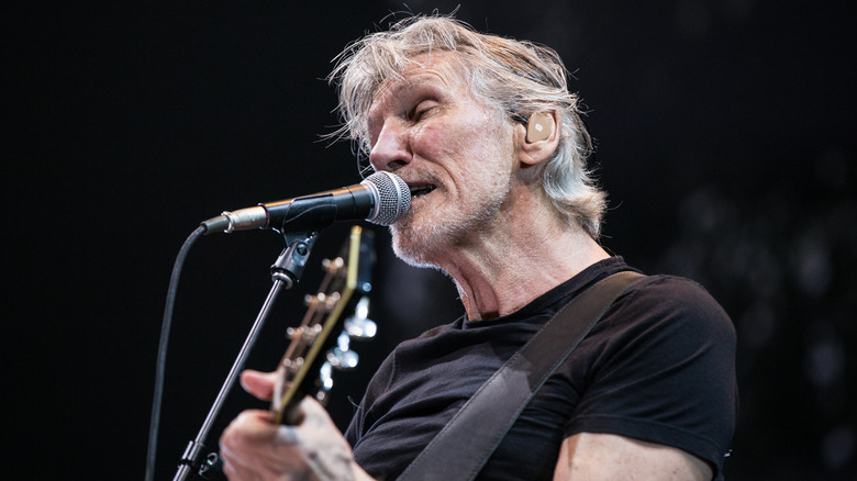 Roger Waters on stage performing