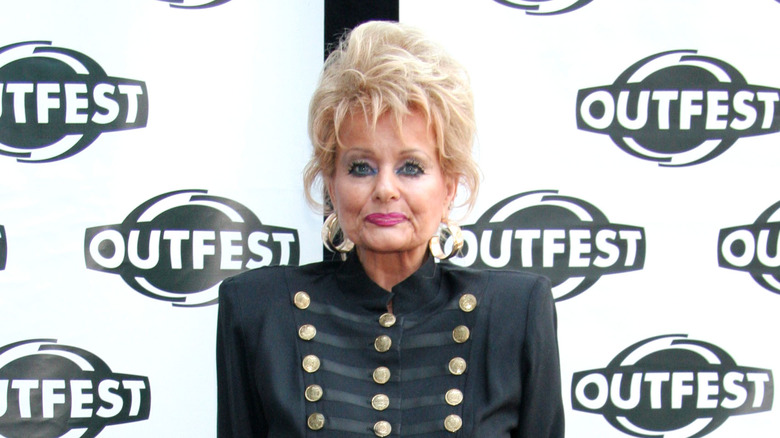 Tammy Faye Bakker pose for a photograph at Outfest